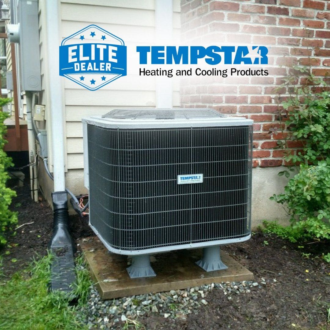 Tempstar HVAC Unit up against brick home